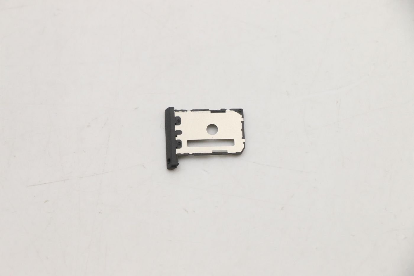 Img_32569223.jpg Mechanical cover for SIM tray for Lenovo devices - Image 1
