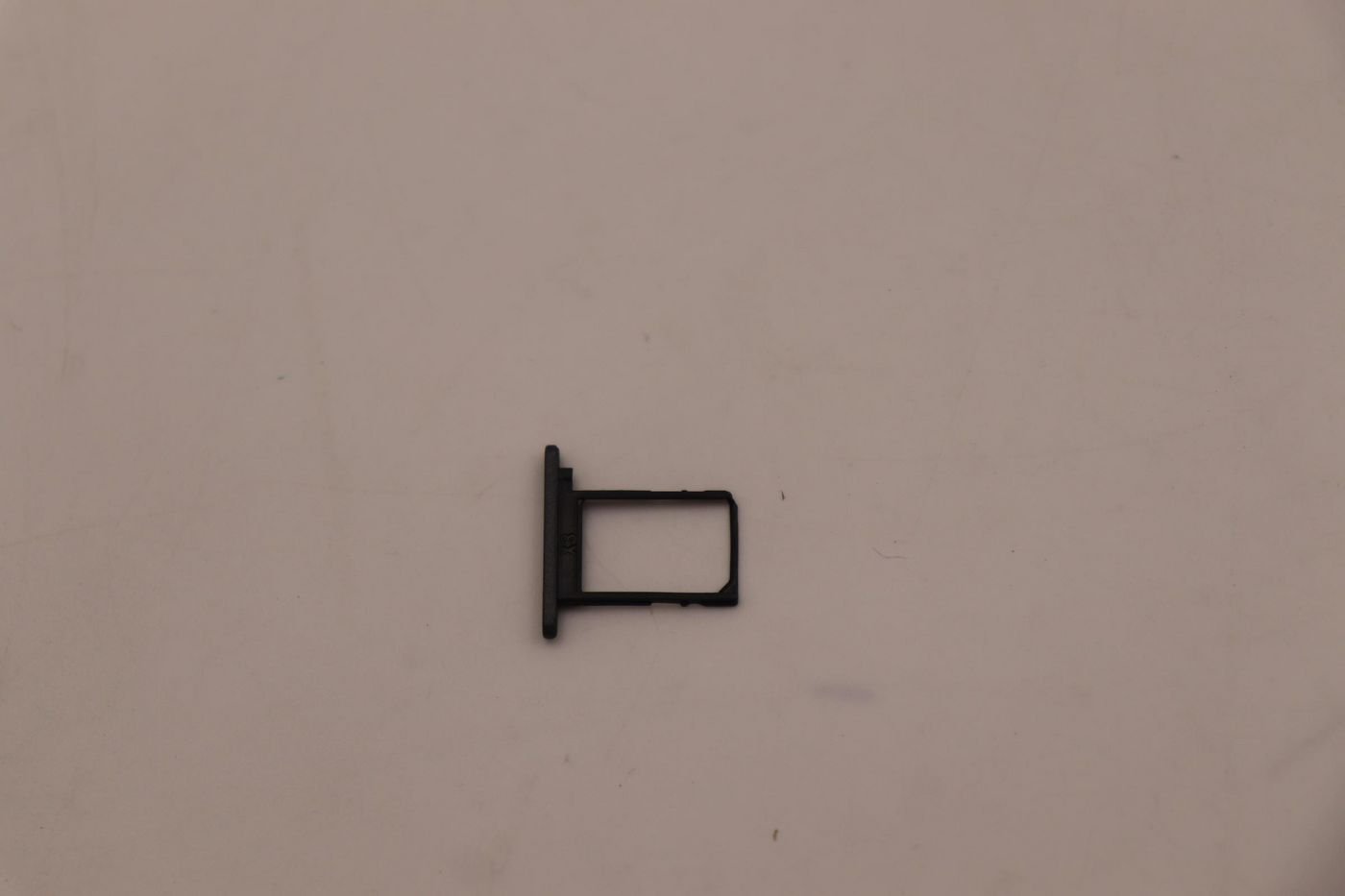 Img_32569230.jpg MECHANICAL FRU T14G3_NANO_SIM_TRAY_GR - Image 1