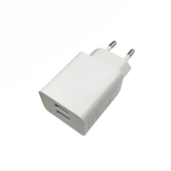 Charger for Smartphones 2.4Amp 2USB Port, Slim Design For smartphones or tablets. Input: 230V. Output: 5V/2.4A/12Watt